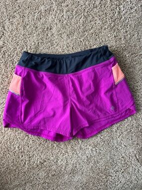 Athleta Girl Magenta Shorts with Black Waistband and Peach Pocket Accents | L/12